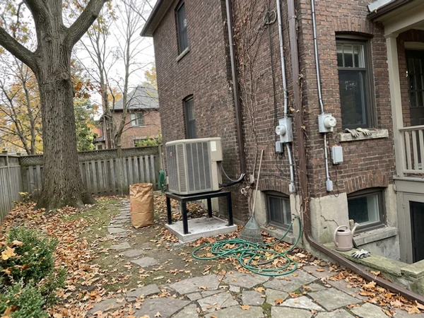 Mitsubishi Hyper-Heat outdoor unit installed beside a Rosedale Toronto home