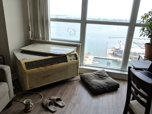 Before: failed PTAC in a Harbourfront condo