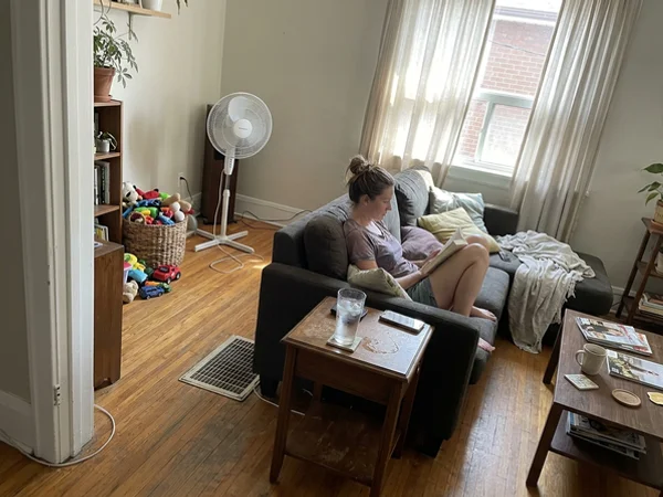 Family room supply register during a July heat wave after the heat pump install
