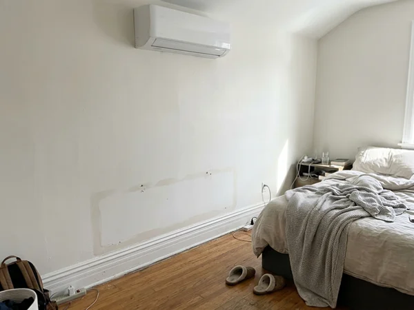 Fujitsu ductless head in a bungalow bedroom
