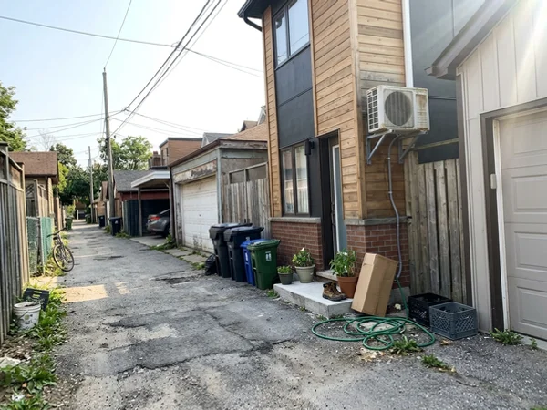 Toronto laneway suite with a mini-split outdoor unit on a wall bracket