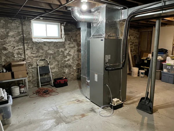 Mitsubishi Hyper-Heat ducted air handler installed in a mechanical room